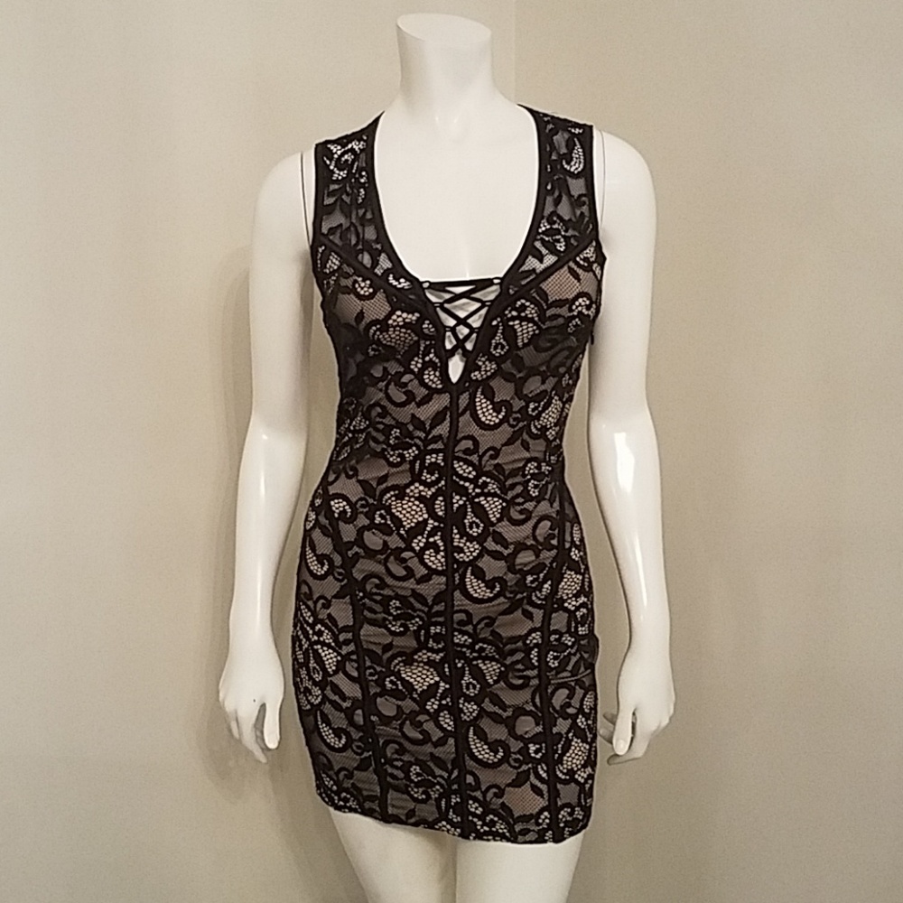 Bebe black and tan lace dress size xs.